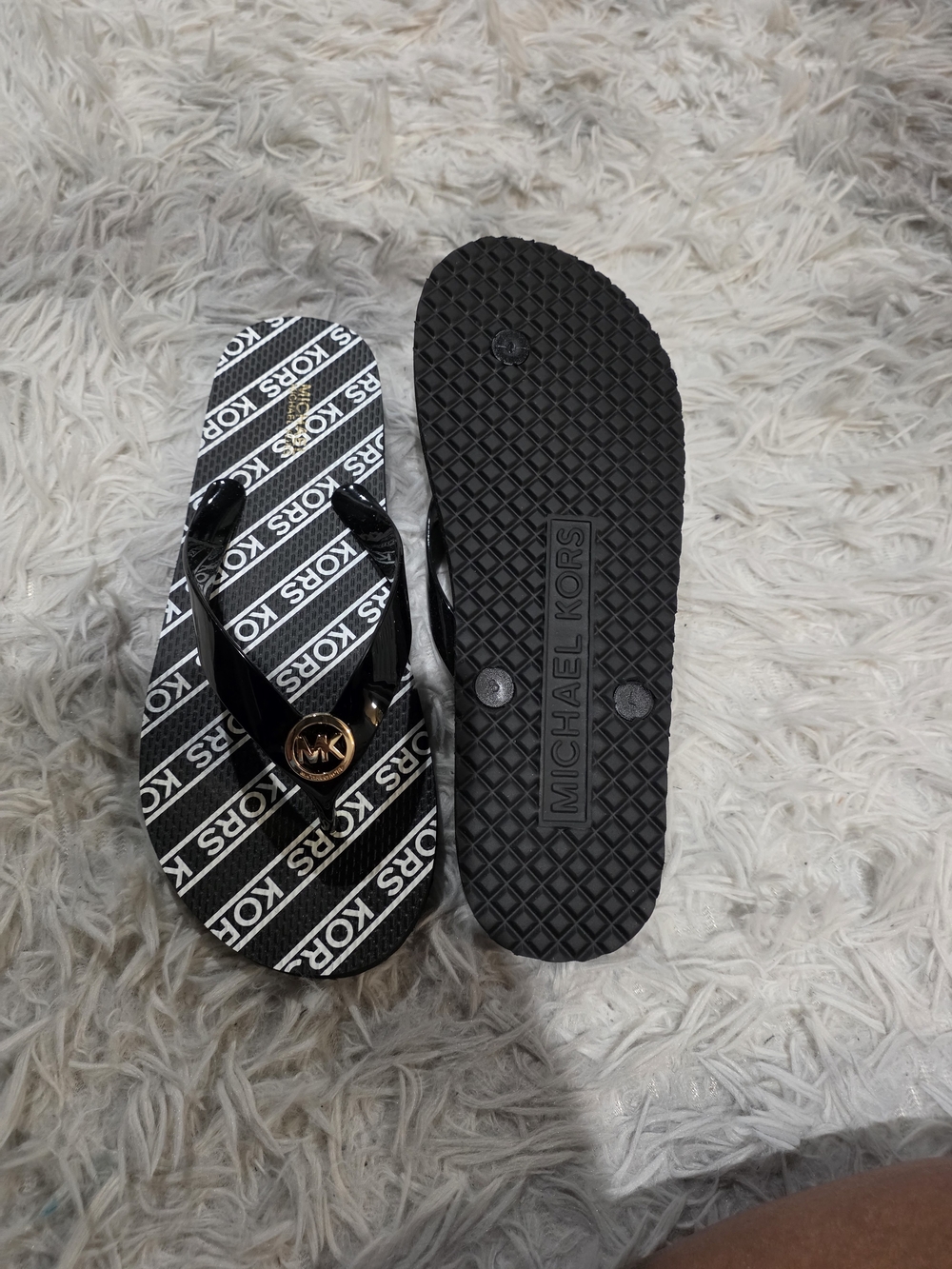 Michael Kors Black Flip-Flop Sandals with Gold Logo Accent